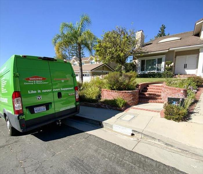 SERVPRO truck outside of a home